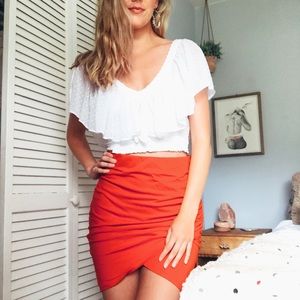 High waisted fitted skirt with cross front red
